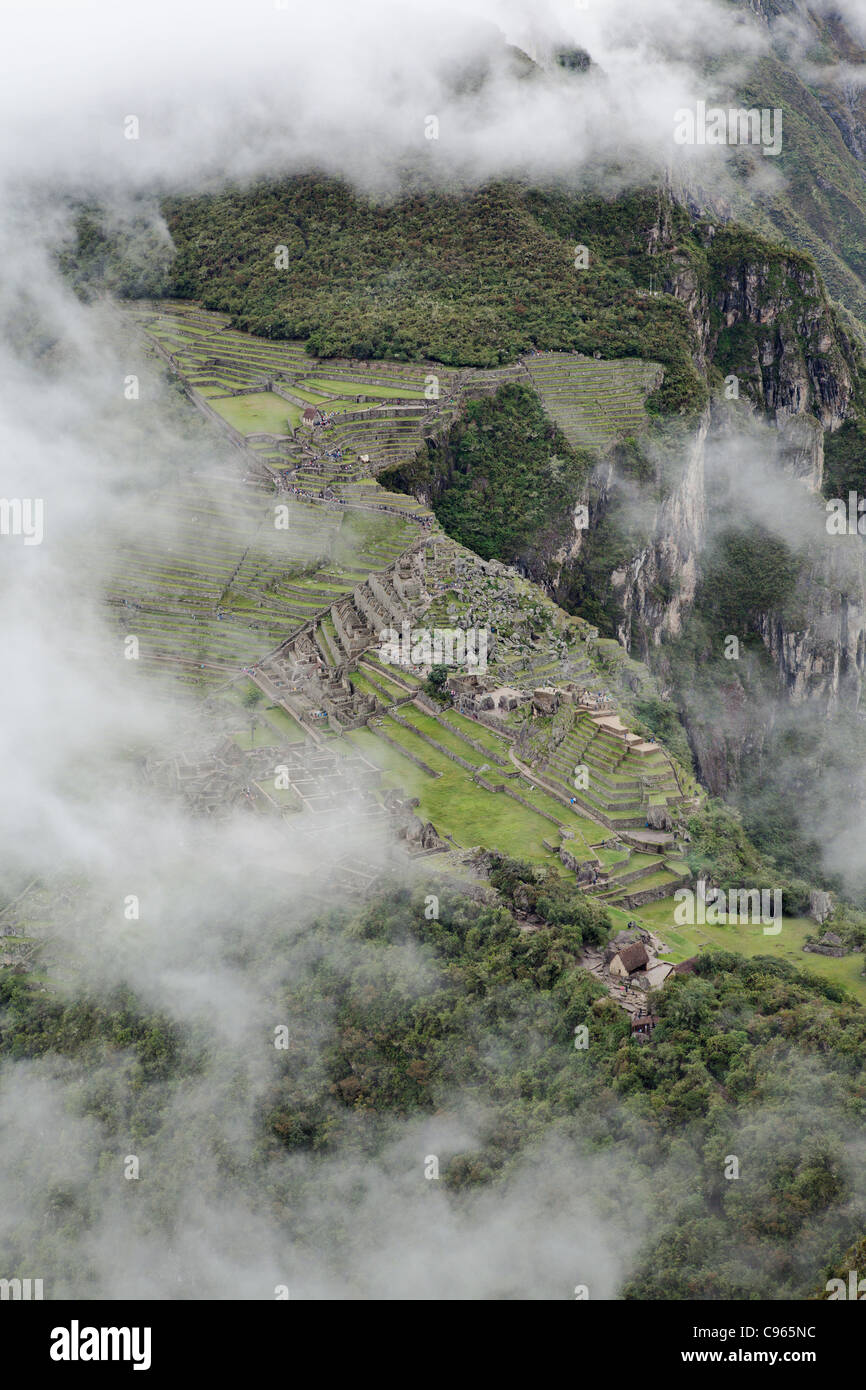 Machu Picchu, the most known tourist site in Andes mountains, Peru, seen from Wayna Picchu mountain top. Stock Photo