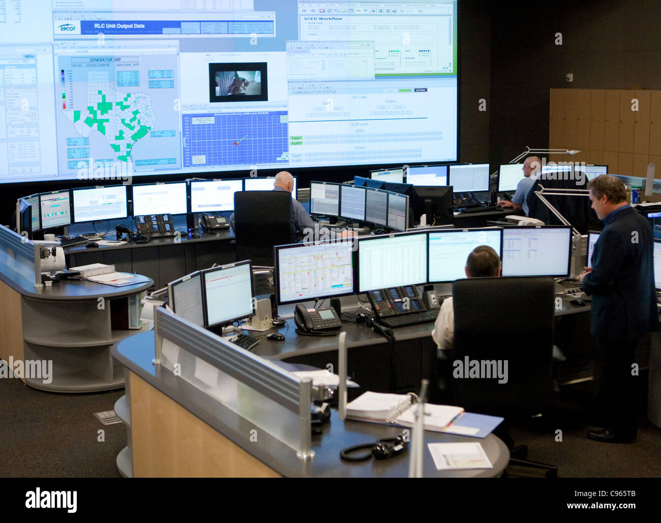 Workers inside command center of the Electric Reliability Council of Texas (ERCOT) which manages the flow of electric power to m Stock Photo