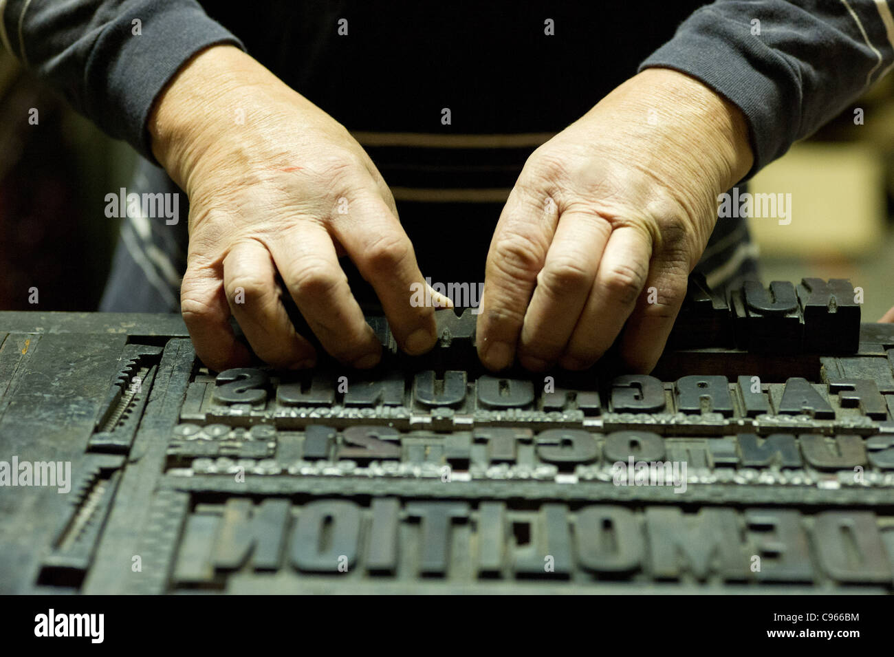 Hands working with print block letters  Stock Photo