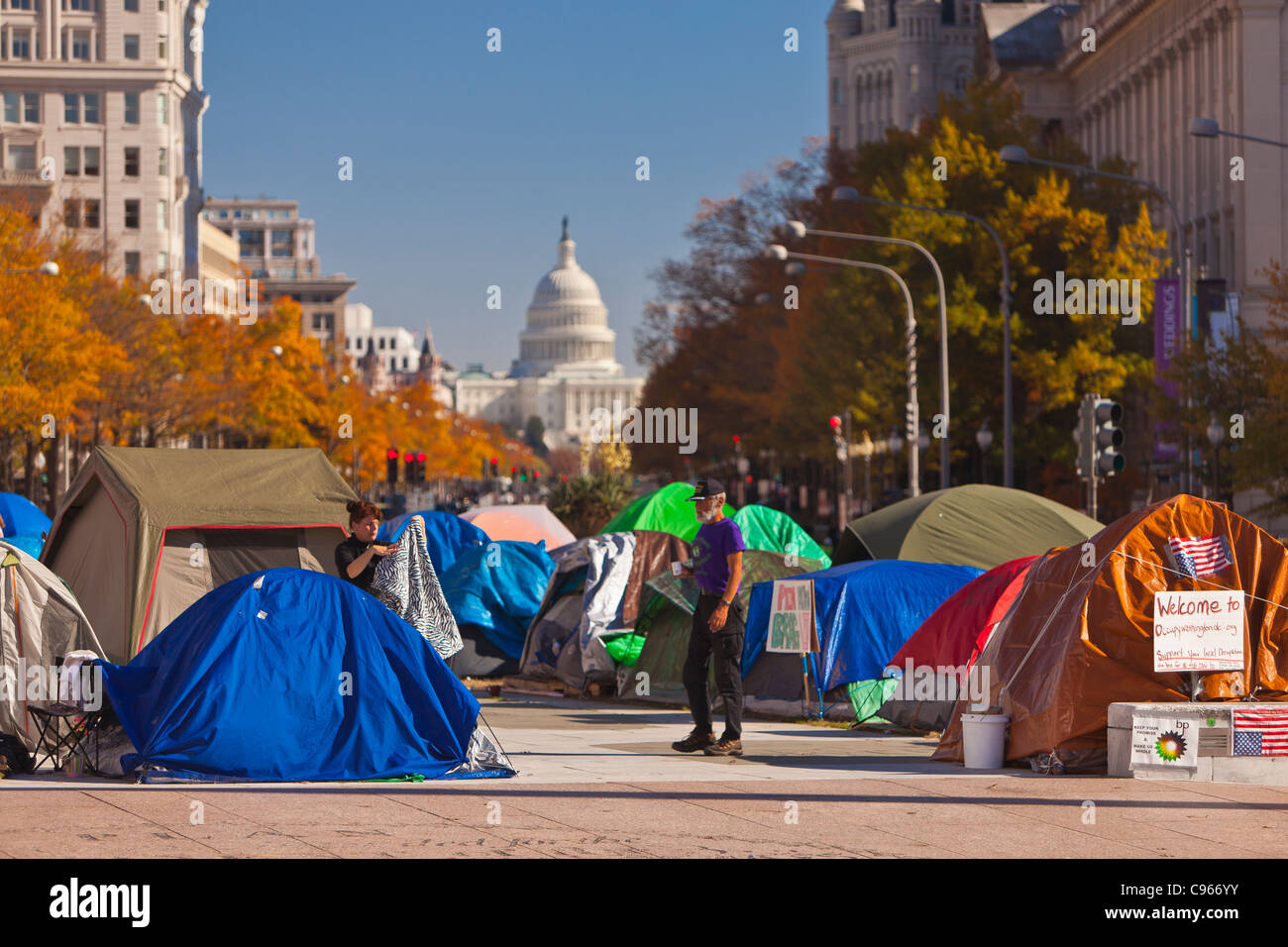 WASHINGTON, DC USA - Occupy Washington protest camp at Freedom Plaza and U.S. Capitol dome in distance. Stock Photo