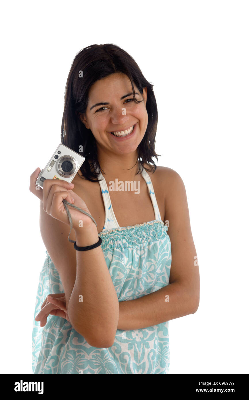 Portrait of happy young woman holding camera on white background Stock ...