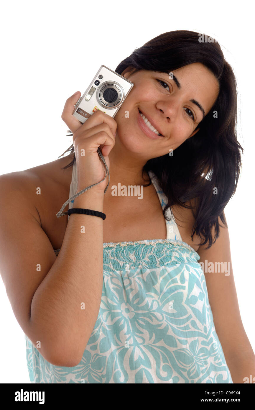 Portrait of happy young woman holding camera on white background Stock ...