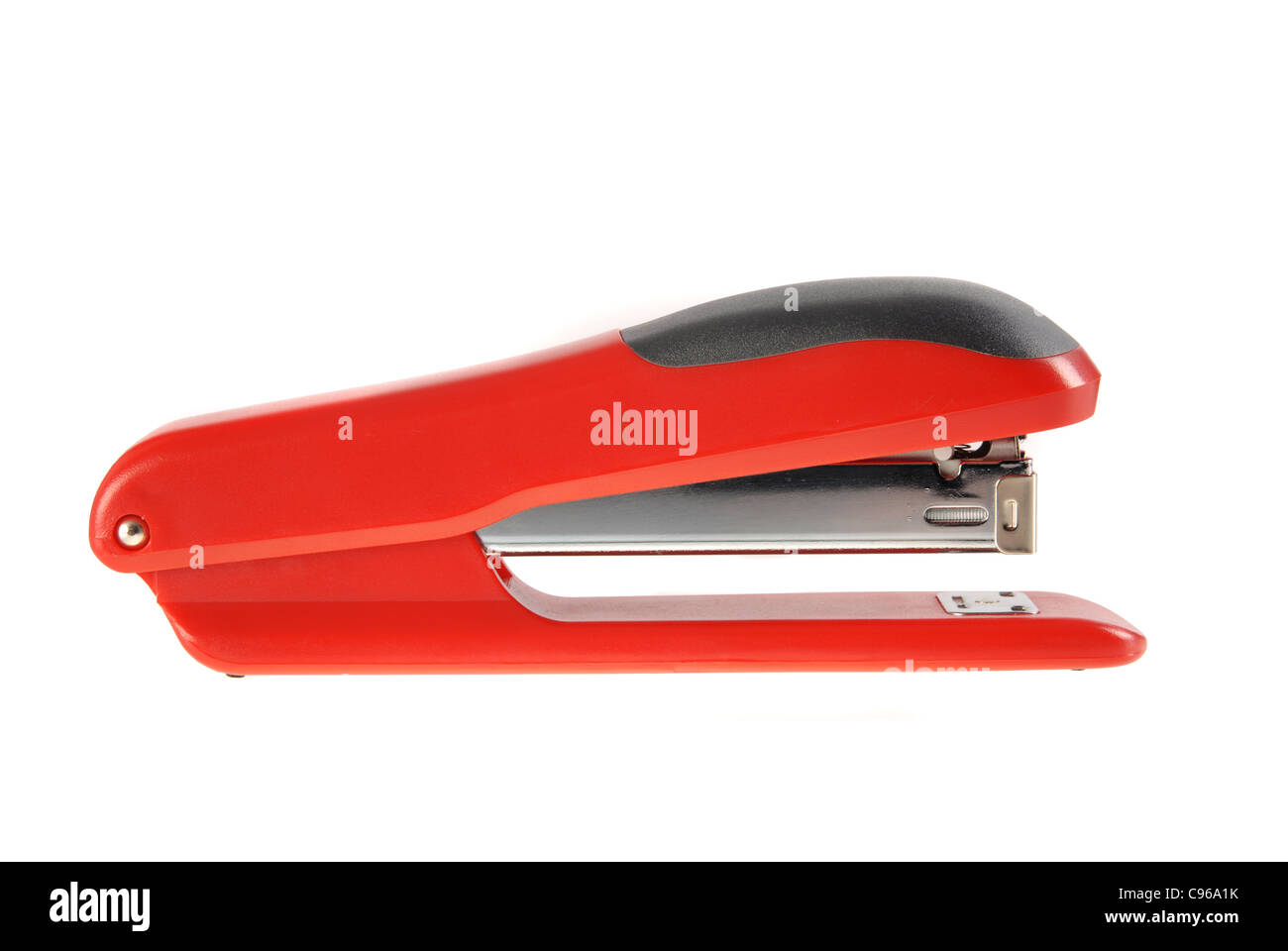 A red and black stapler isolated on white background. Included clipping path, so you can easily cut it out and place over the top of a design. Stock Photo