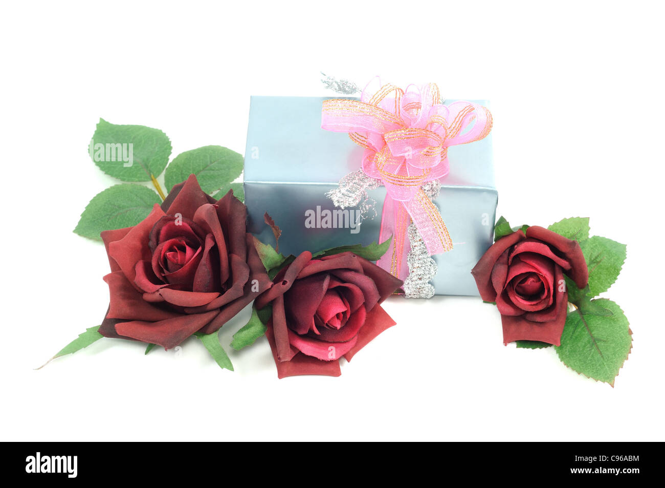 Blue Gift box and red roses, isolated on white background Stock Photo