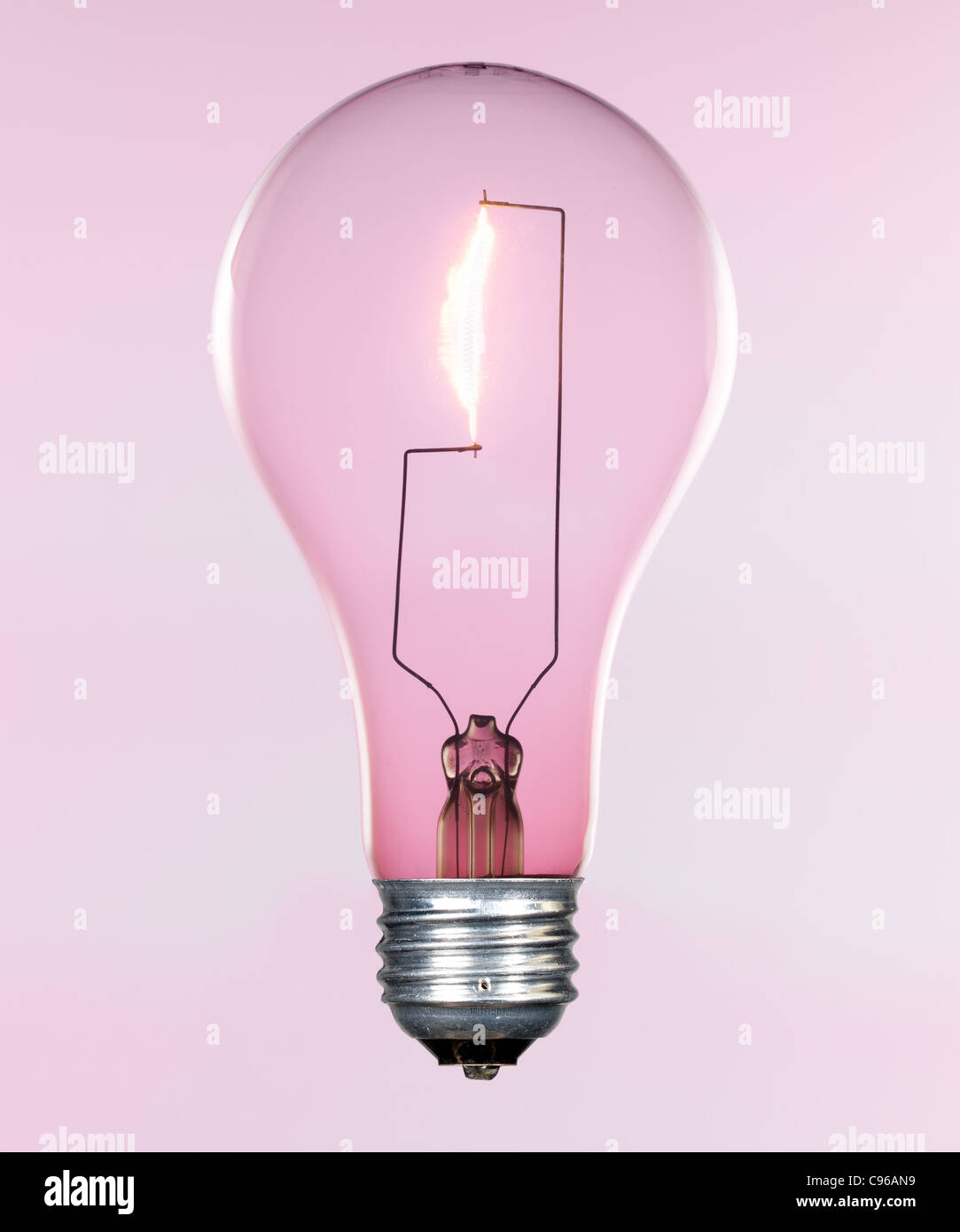 Glass incandescent tungsten filament light bulb due to be replaced due