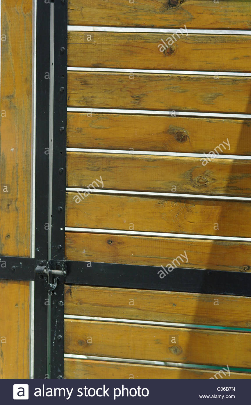 Wooden Security Door With Black Metal Trim Wood Slats Gate Varnished Stock Photo Alamy