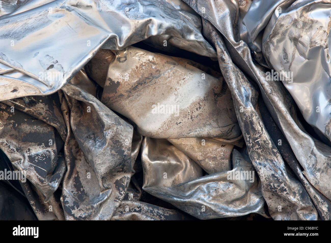 Recycling, compacted stainless steel sheeting Stock Photo