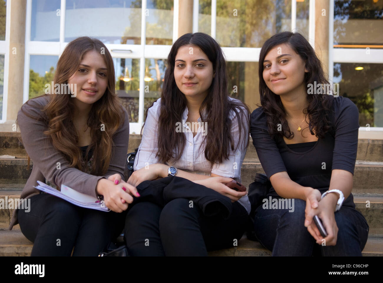 Three young students on the campus of the American University of Beirut (AUB), Bliss Street, Ras Beirut, Lebanon. Stock Photo