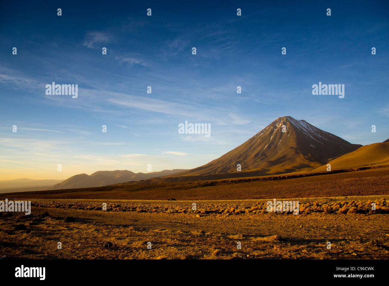 Licancabur at sunset. Is a highly symmetrical stratovolcano on the southernmost part of the border between Chile and Bolivia. Stock Photo