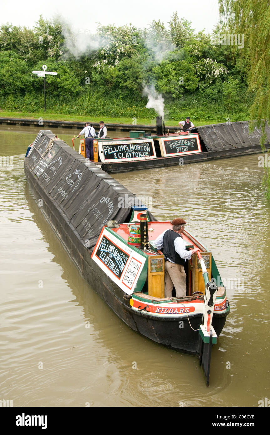 Steam narrowboat President towing it's butty Kildare Stock Photo
