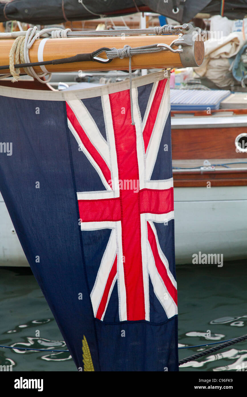 English flag on Classic yacht sailing boats Stock Photo - Alamy