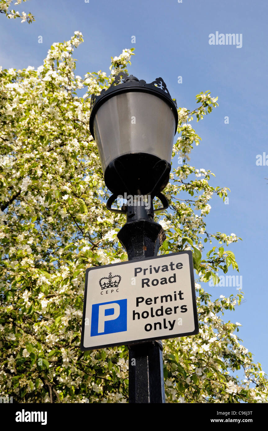 Sign on old ornate lampost saying Private Road Permit holders only - CEPC Stock Photo