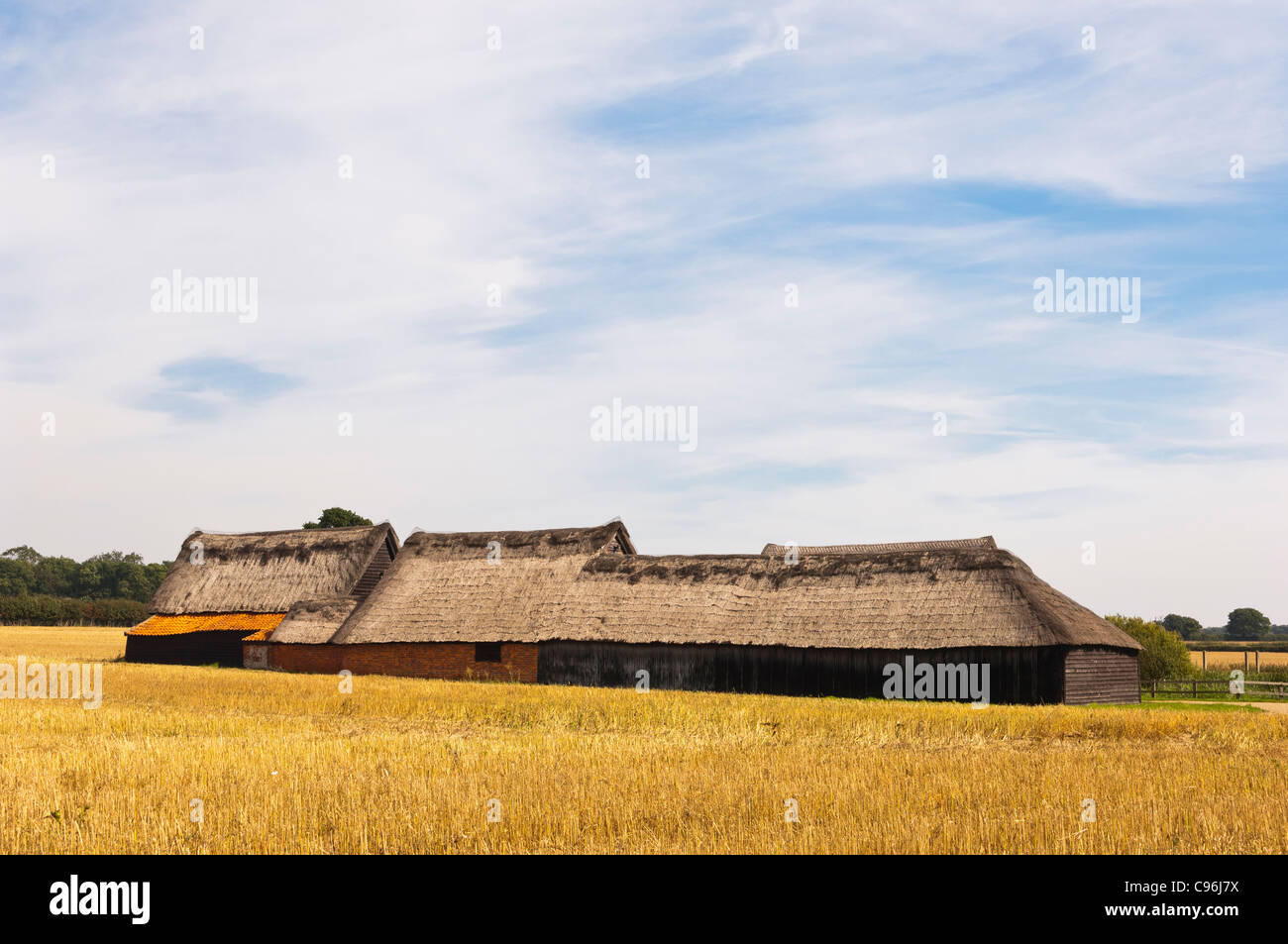 A barn with a thatched roof on the estate at Benacre , Suffolk ...