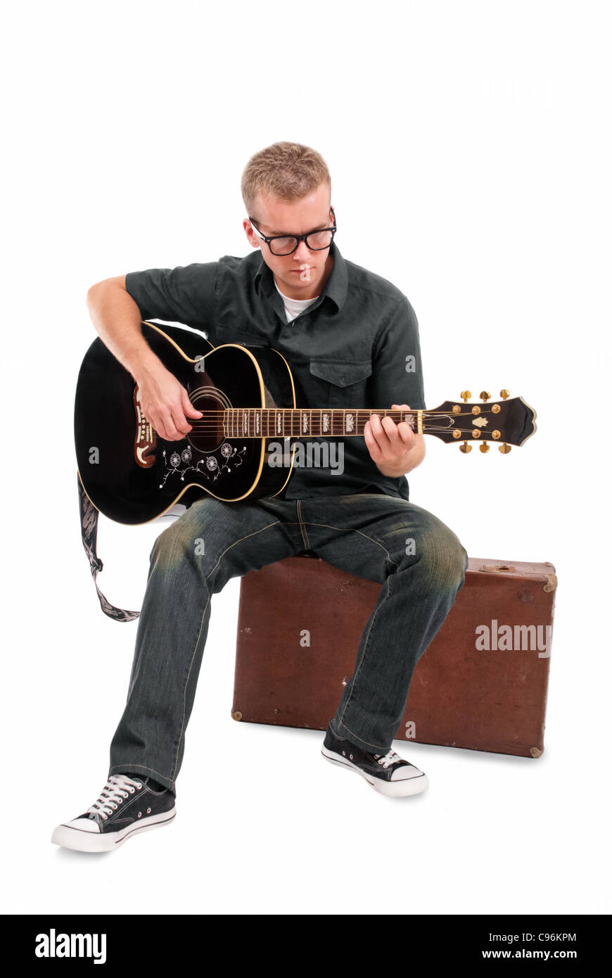 Musician playing solo on guitar. All kinds of musical instruments in different situations. Stock Photo
