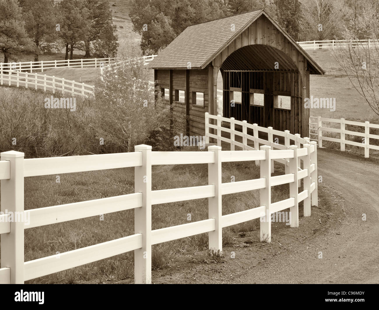 Covered bridge and fence. Near Mitchel, OR Stock Photo