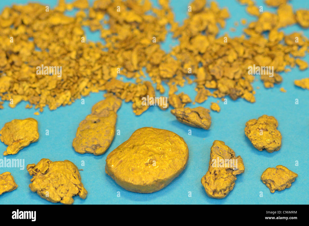Gold nuggets and flakes Stock Photo Alamy