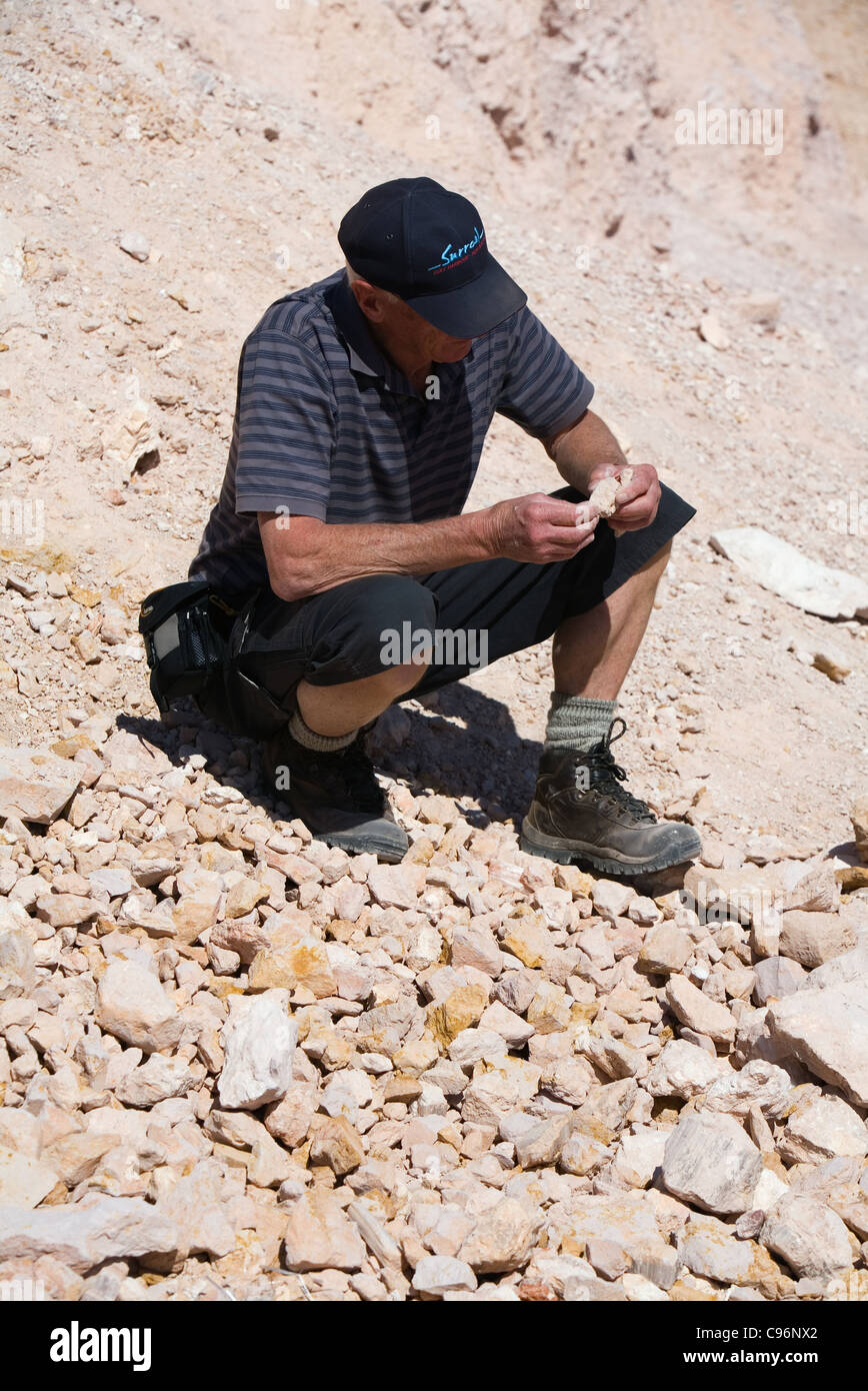 Man noodling (fossicking) for opals in the outback town of Coober Pedy