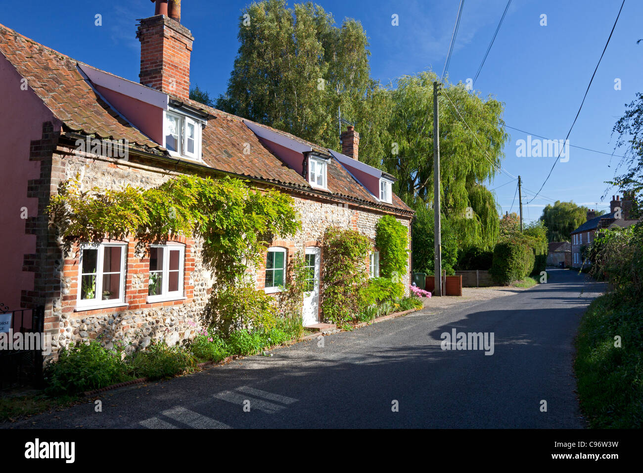 Late Afternoon Sun On Cottages In The Village Centre Briningham