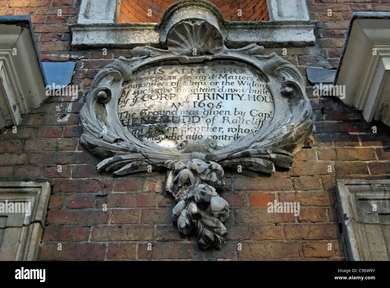 plaque marking the 1695 trinity green almshouses in whitechapel , east london , england Stock Photo