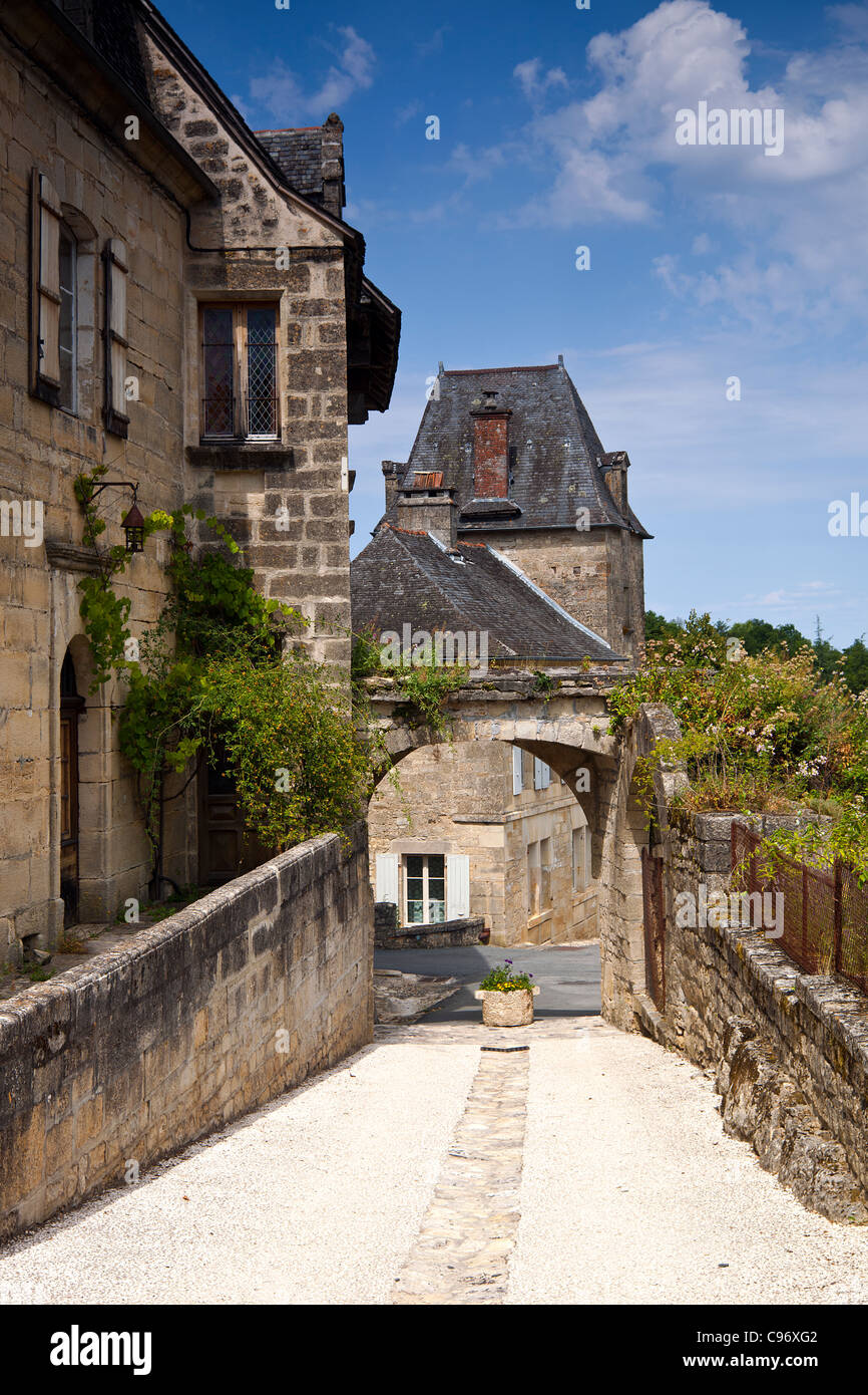 Narrow street in the medieval village of Saint-Robert in the Correze, France Stock Photo