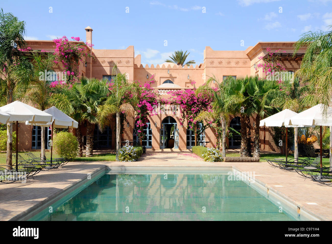 A riad in the Palmeraie district of Marrakesh, Morocco. 'Riads' are grandiose villa or a palace with great garden or courtyards. Stock Photo