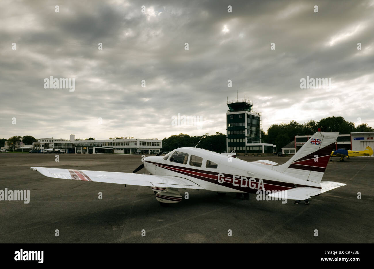 Stationary light aircraft standing at Le Touquet airfield in France Stock Photo