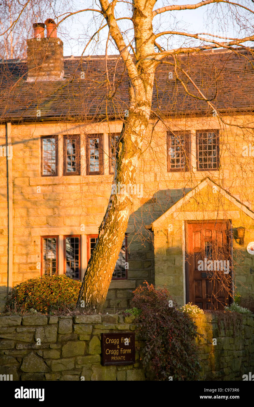 Late Rural England late afternoon winter sun strikes a rural cottage in lancashire,england ...