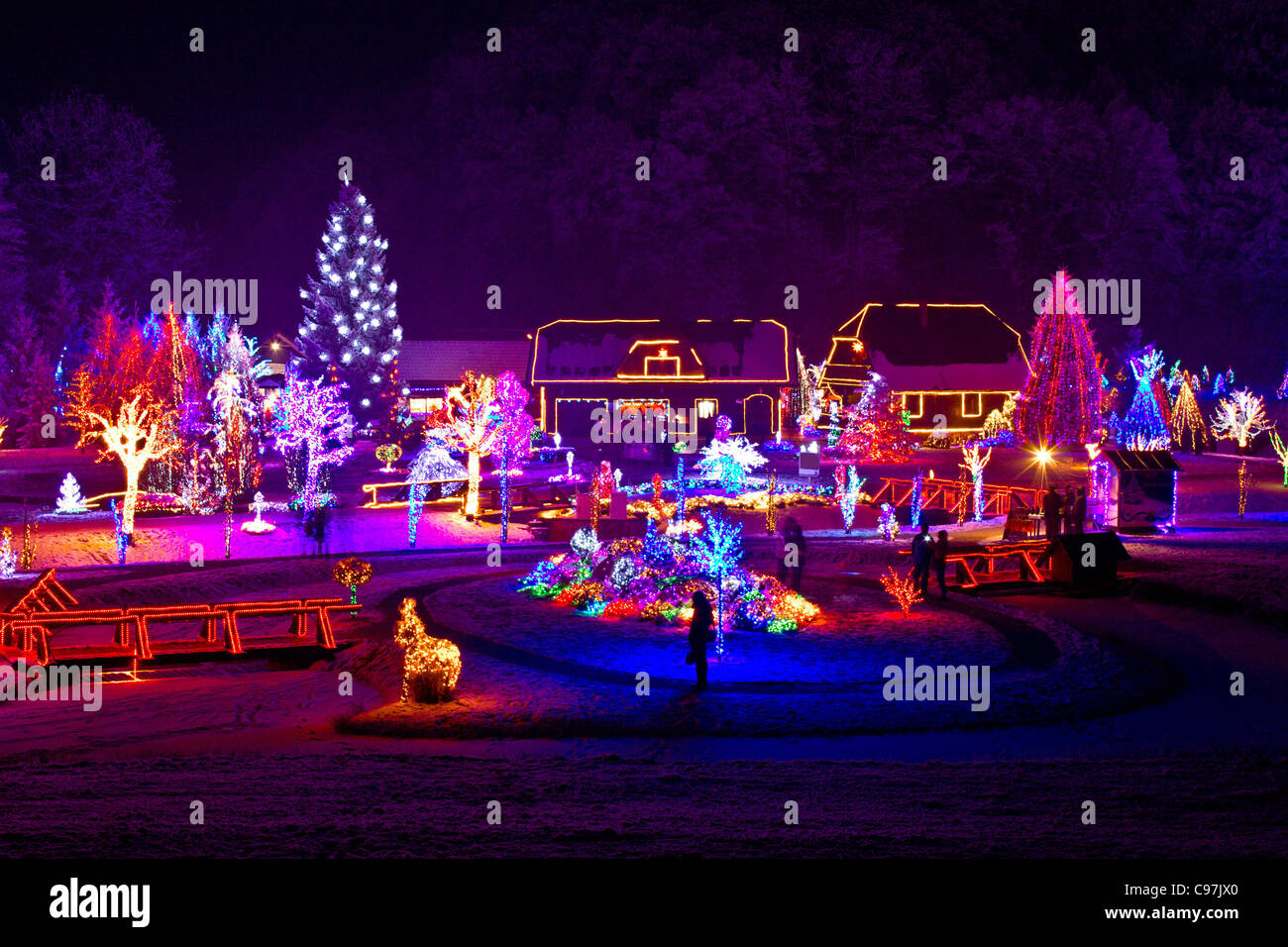 Snowy scene of cottage at night hires stock photography and images Alamy