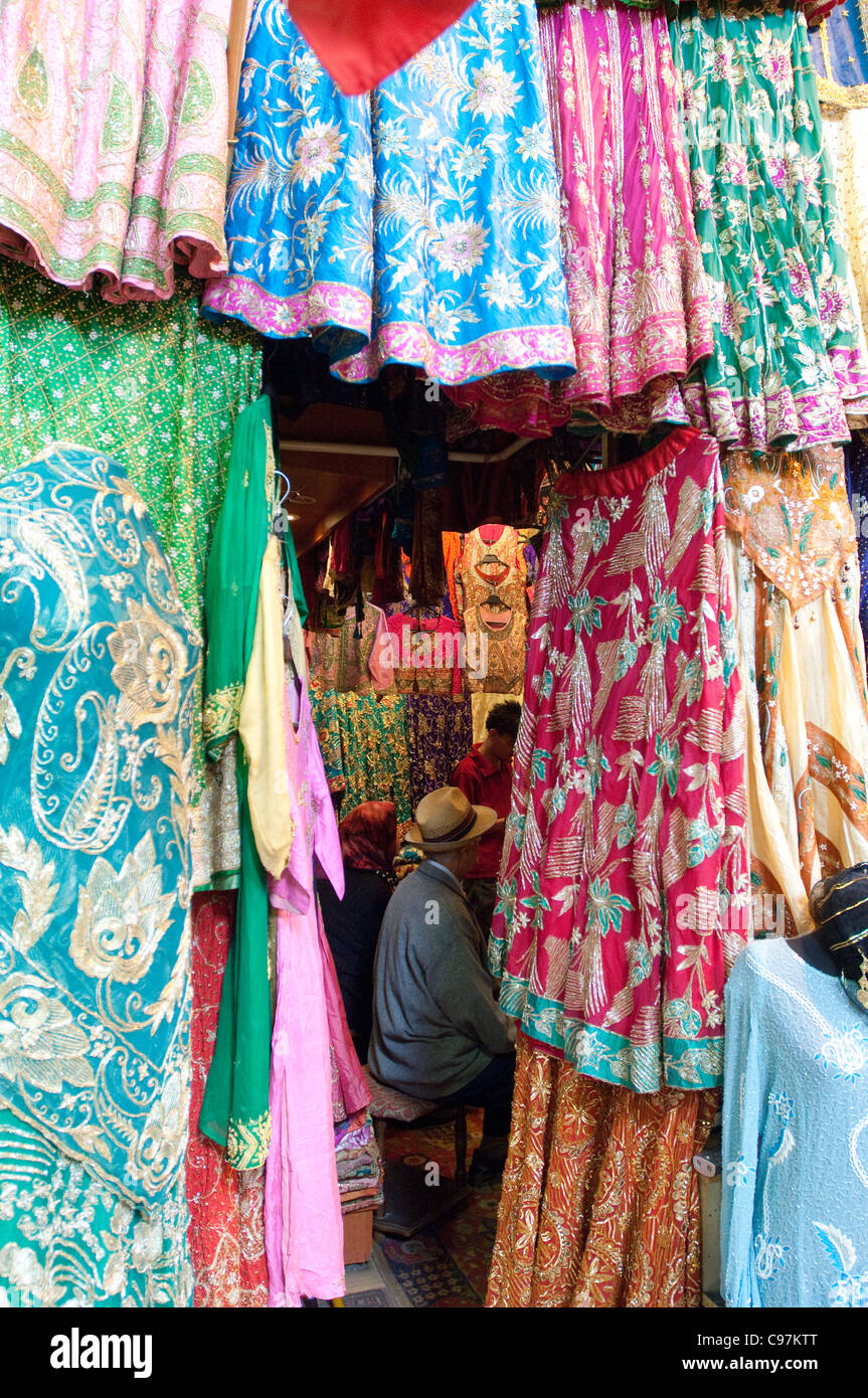 Turkey. Istanbul. Man shopping for fabric in the Grand Bazaar Stock