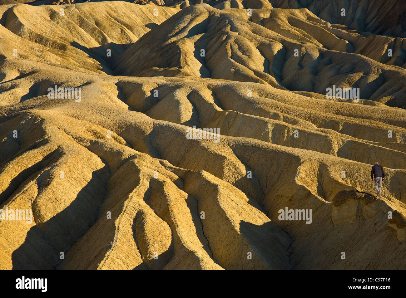 Hiker In Badlands, Death Valley National Park, USA Stock Photo - Alamy