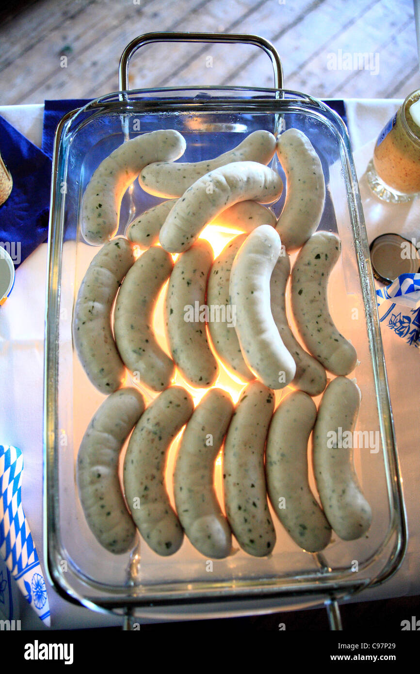 close up of bavarian veal sausage weisswurst boiled in hot water Stock Photo