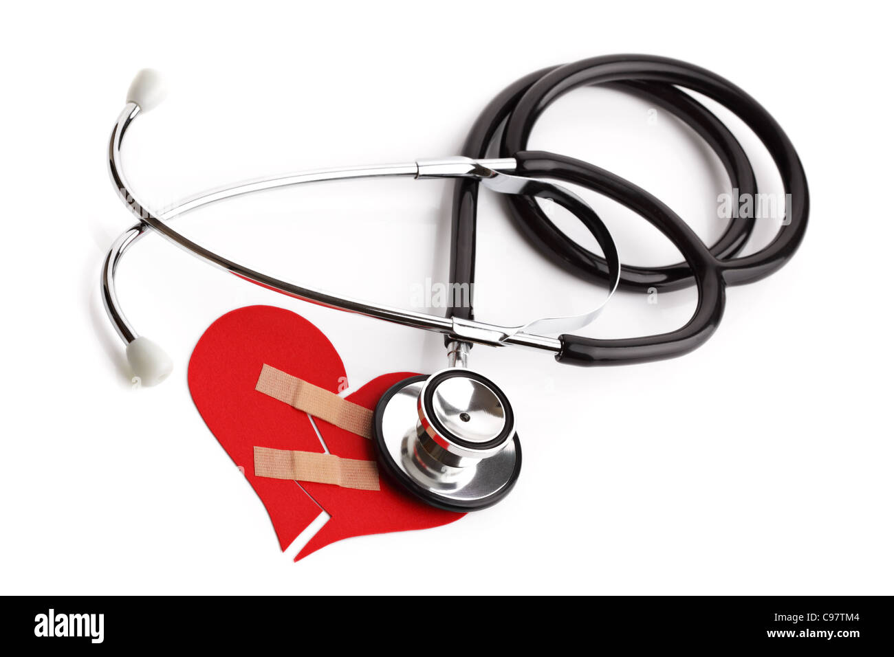 Stethoscope and broken heart concept for heart disease or illness Stock Photo