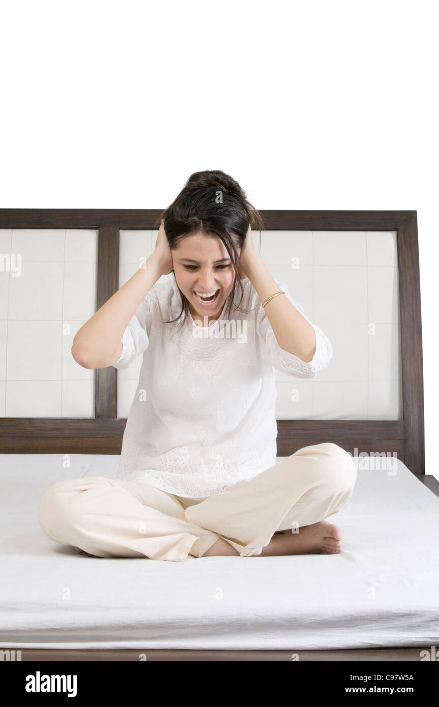 Girl sitting on hands hi-res stock photography and images - Alamy