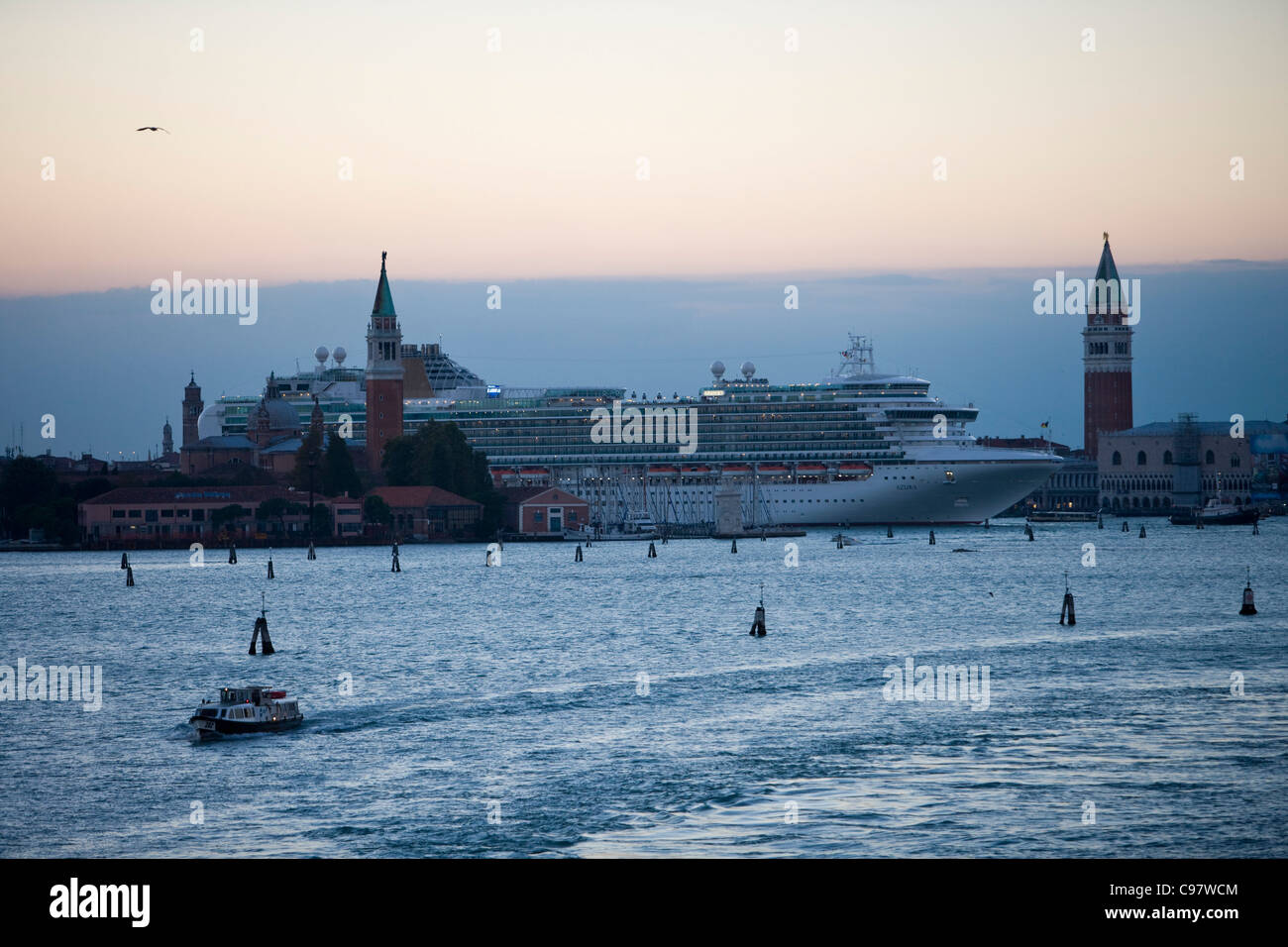 Cruiseship Azura, P and O Cruises, on Canale di San Marco and Campanile tower at dusk, Venice, Veneto, Italy, Europe Stock Photo