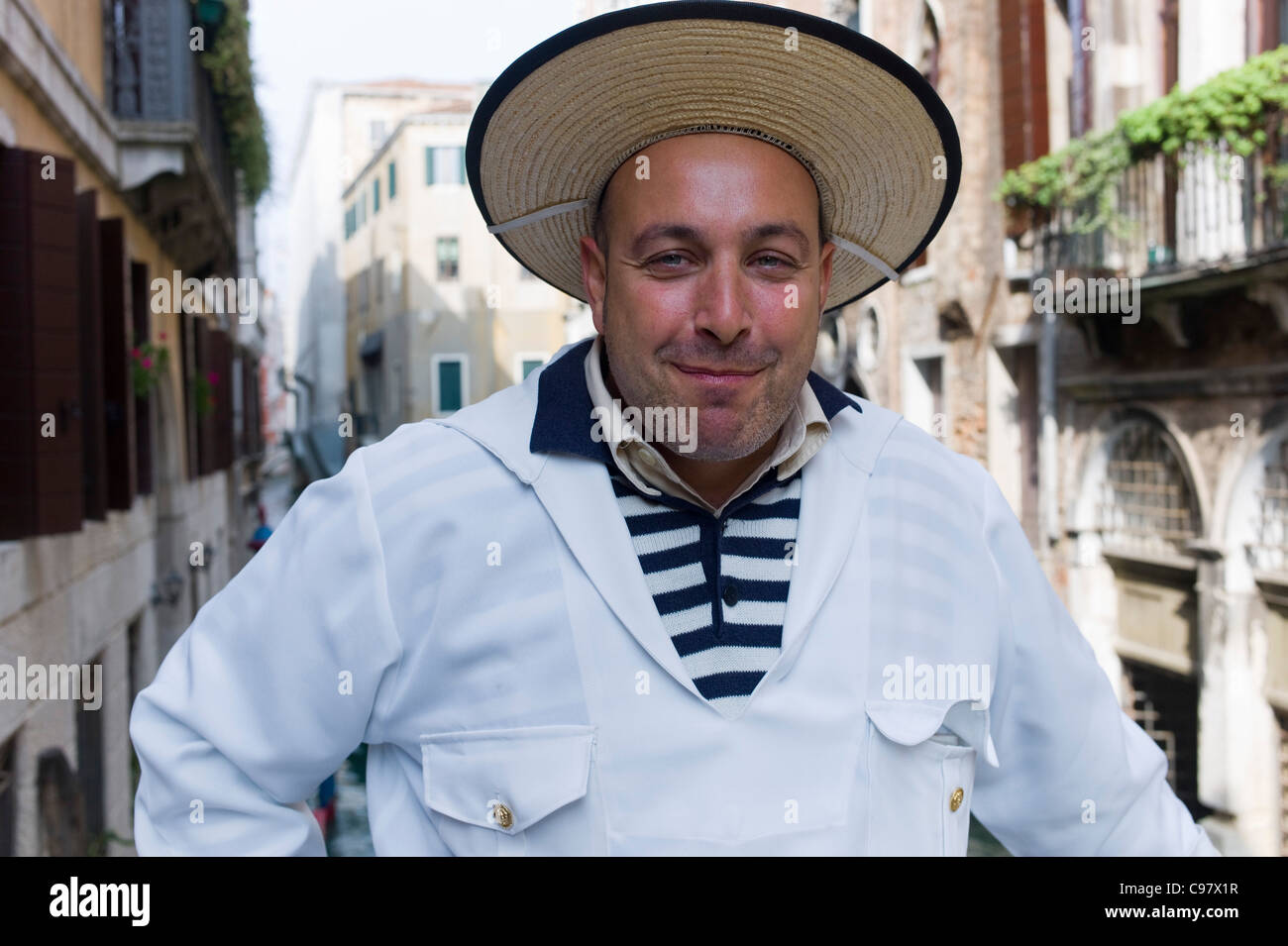 Cheerful gondolier, Gondolieri wearing traditional clothes, Venice