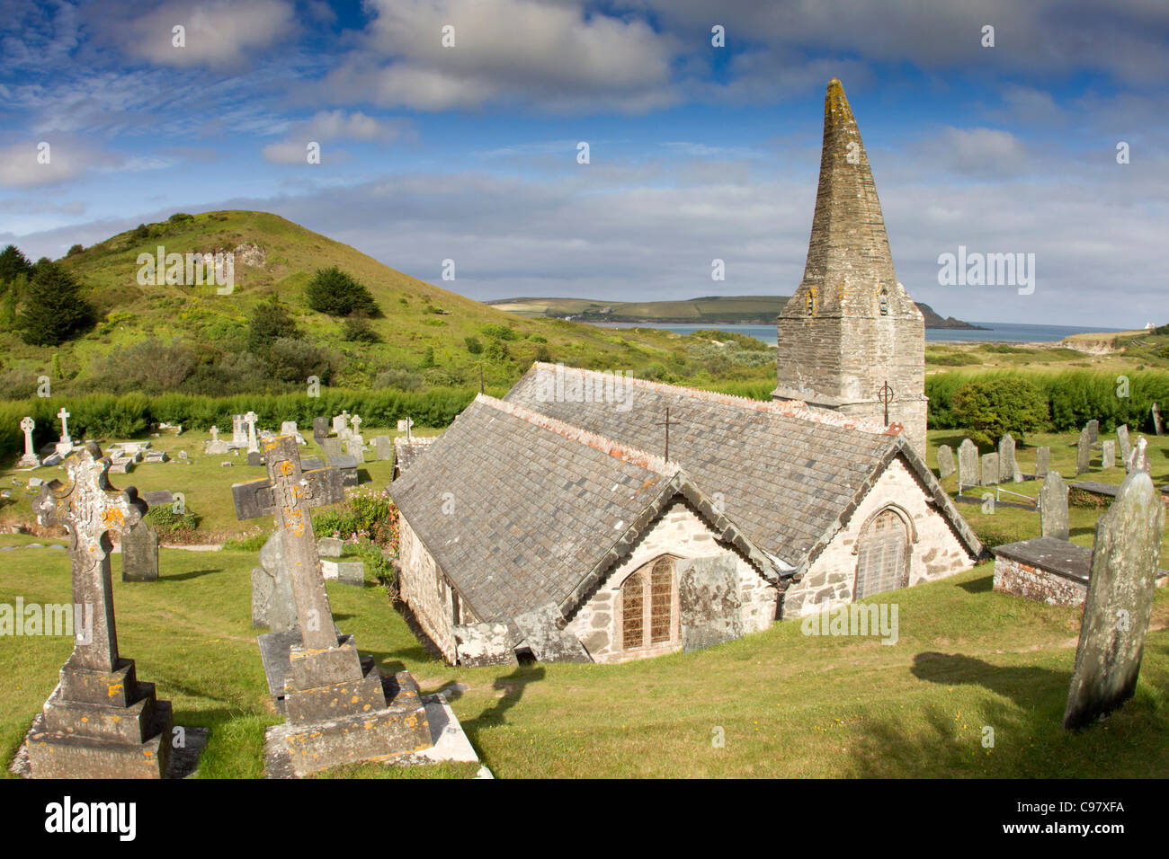St Enodoc Church; cemetery; looking towards Camel Estuary; Cornwall; UK Stock Photo