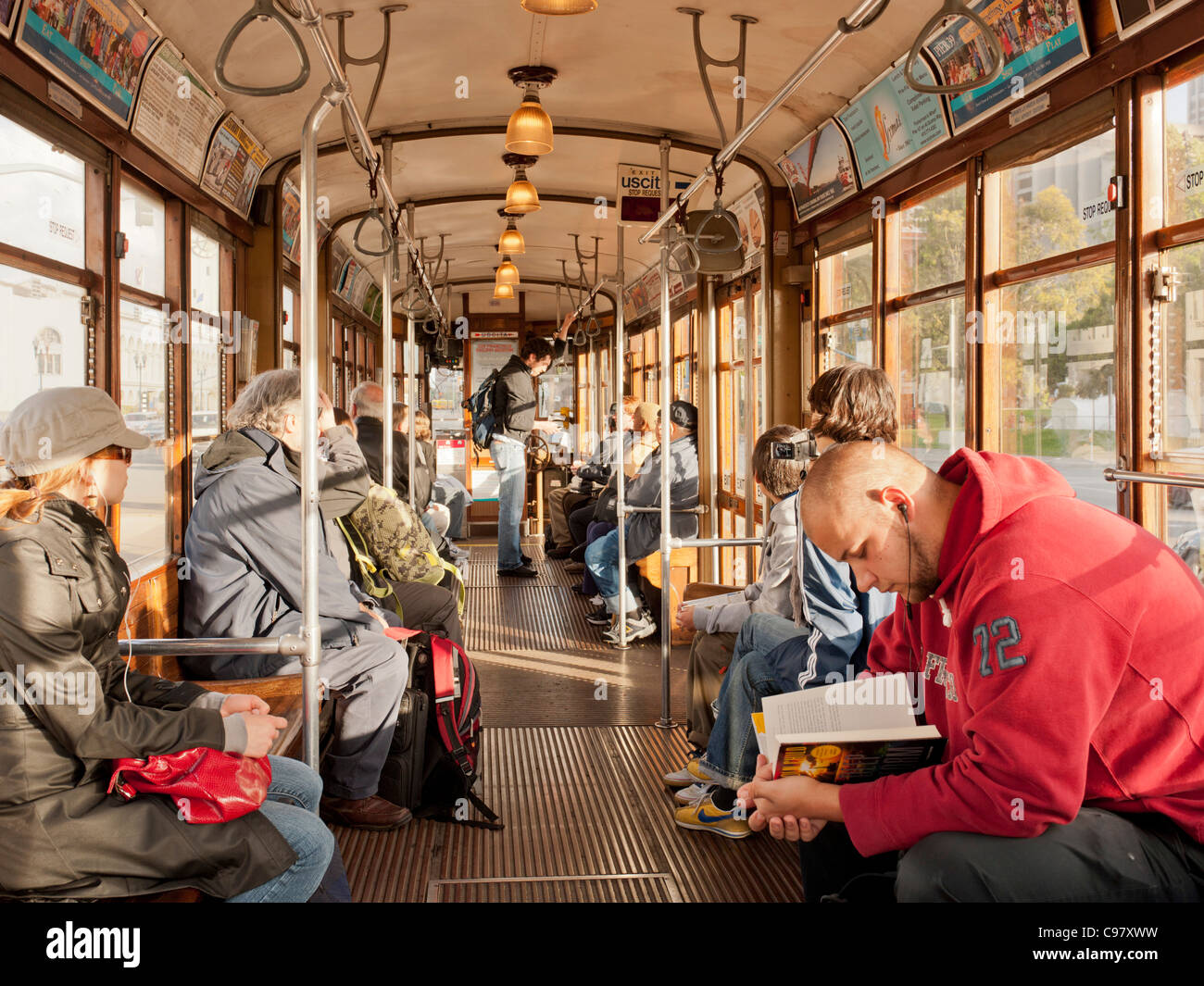 Commuters inside Street car, San Francisco Stock Photo