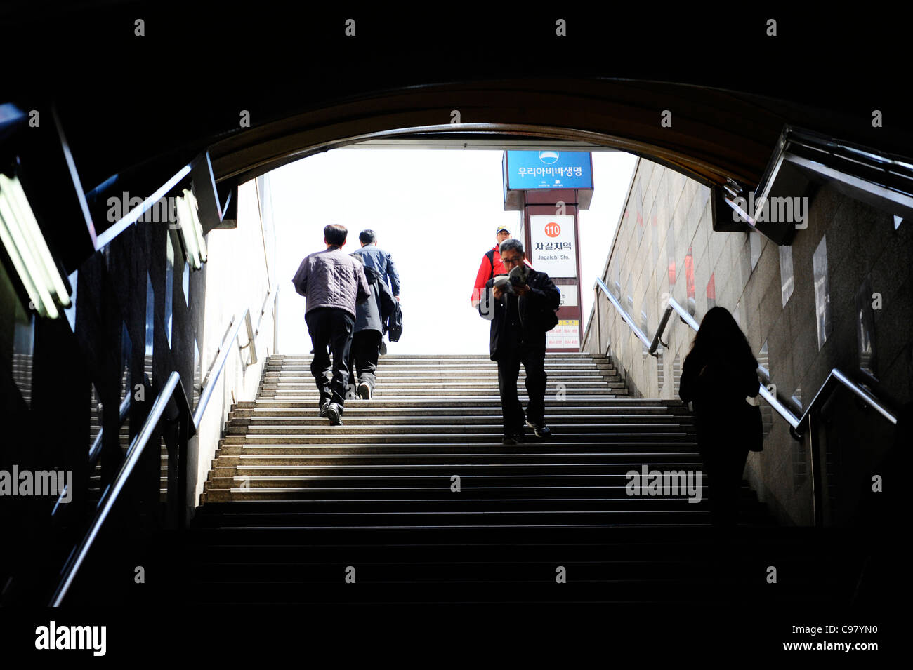 People leaving Jagalchi Station in Busan, South Korea. Stock Photo