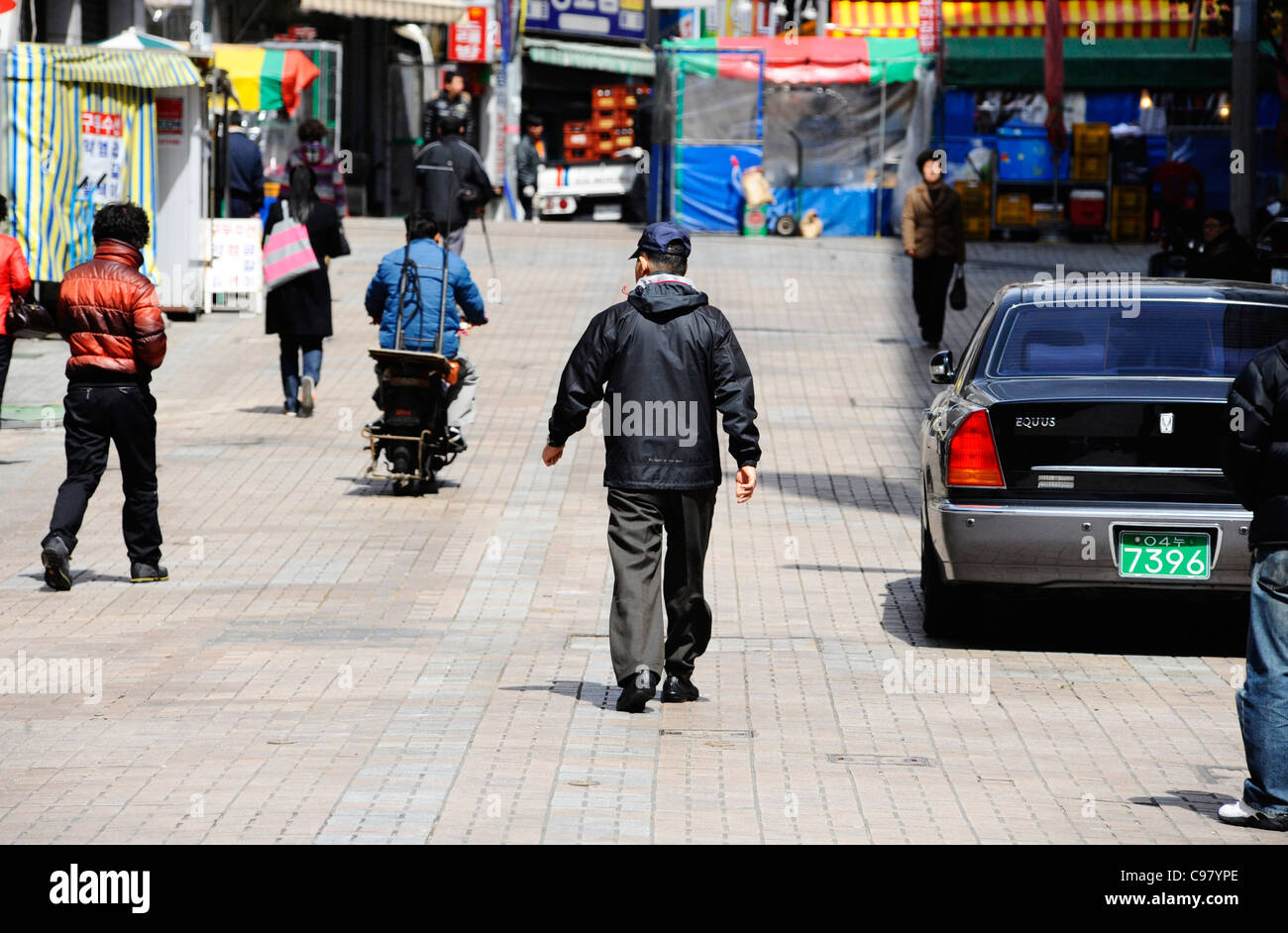 People out walking in Busan, South Korea. Stock Photo
