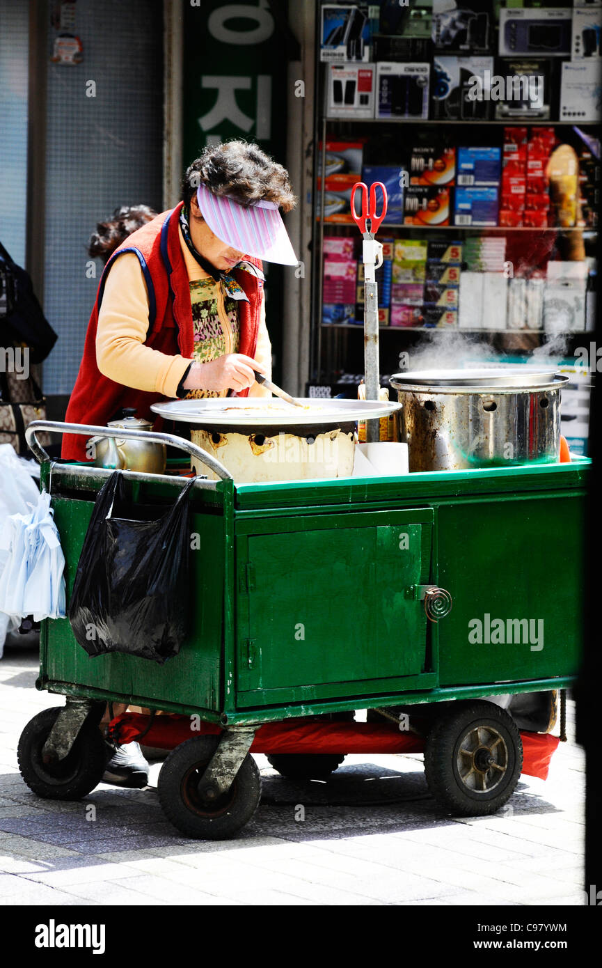 A woman selling street food in Busan, South Korea. Stock Photo