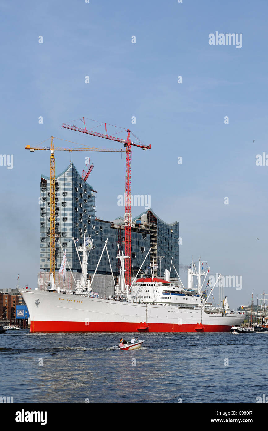 Philharmonic hall under construction and Cap San Diego museum ship, Elbe river, Hamburg, Germany, Europe Stock Photo