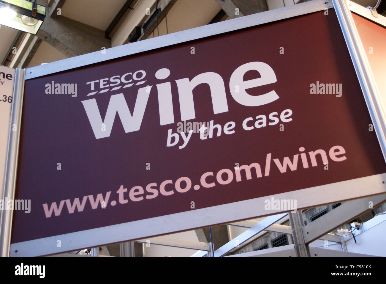 Sign at a Tesco wine fair 'wine by the case' Stock Photo Alamy