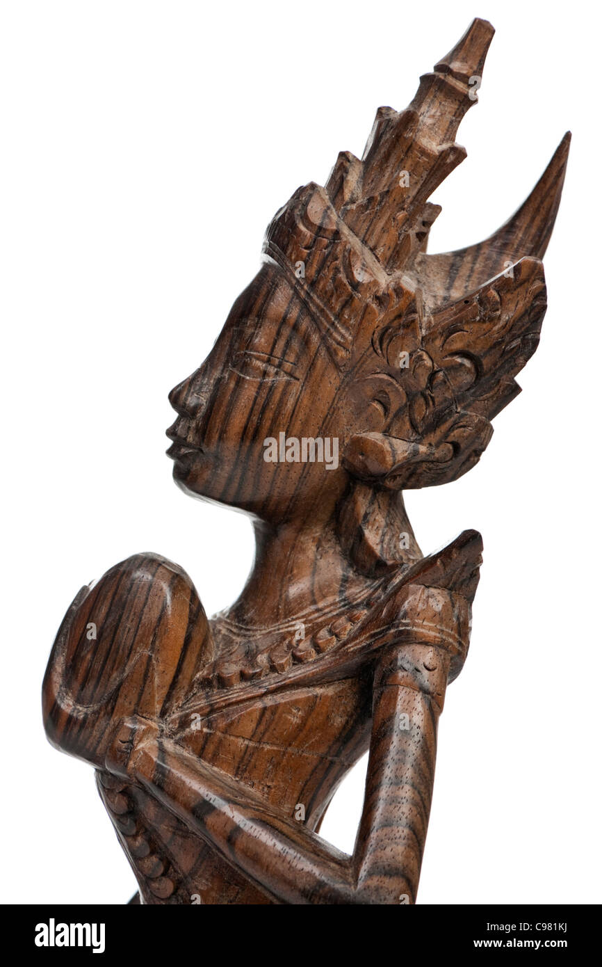 Vintage wooden carved figurine Stock Photo