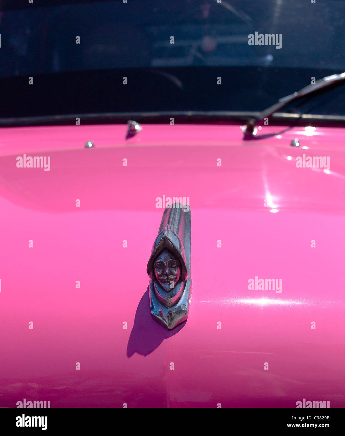 Hood ornament from a pink Chrysler1950 DeSoto DeLuxe on the streets of Havana, Cuba. Stock Photo