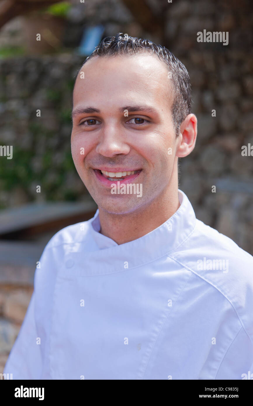 One of the kitchen apprentices., CHATEAU SAINT-MARTIN & SPA - 2490 Avenue des Templiers - BP 102 - 06142 VENCE CEDEX Tél. : + 3 Stock Photo