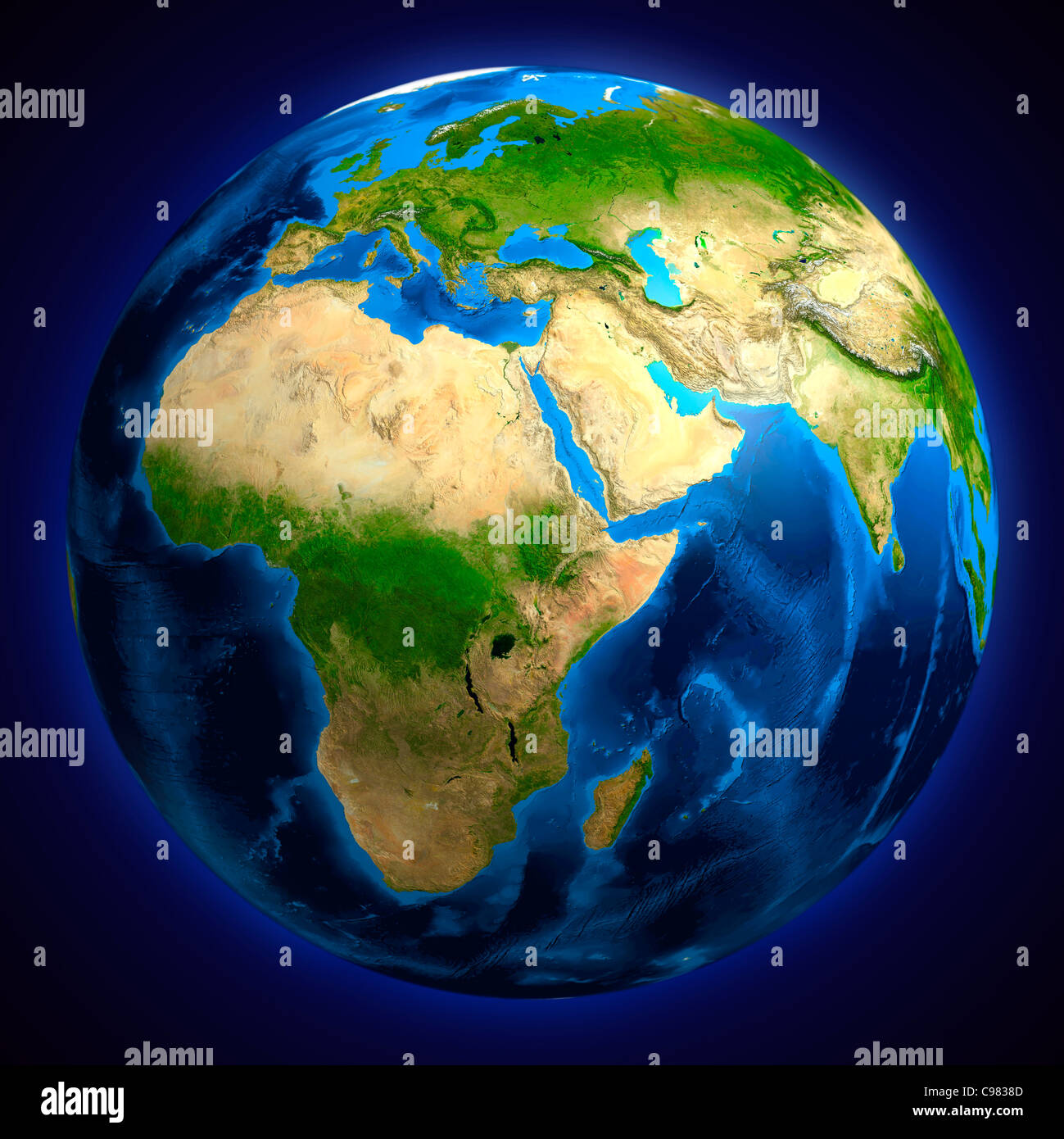 View of the Earth globe from space showing African, European and Asian continents. Isolated on dark blue background. Stock Photo