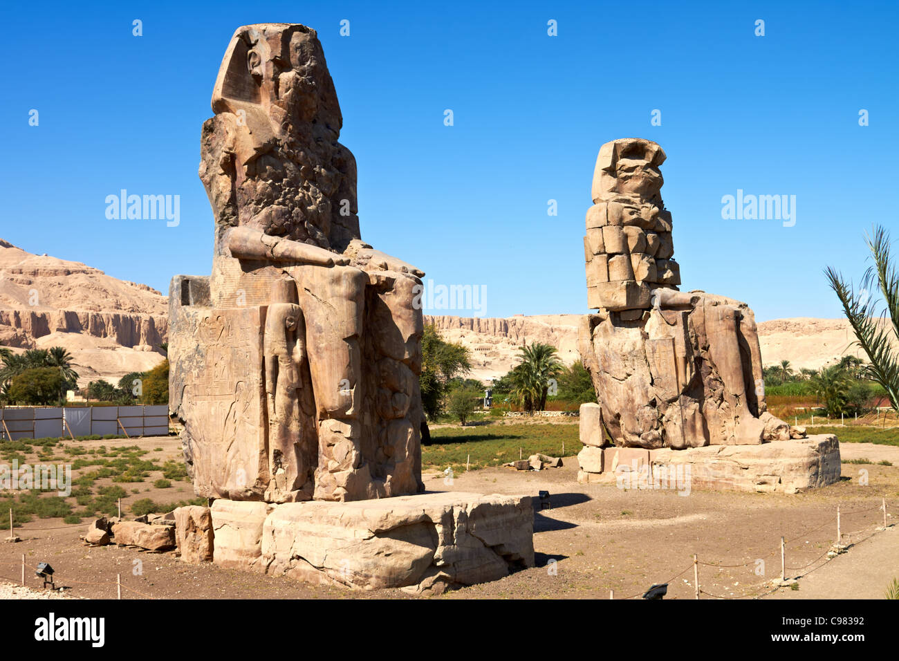 Giant statues near the Kings Valley, Luxor, Egypt Stock Photo Alamy