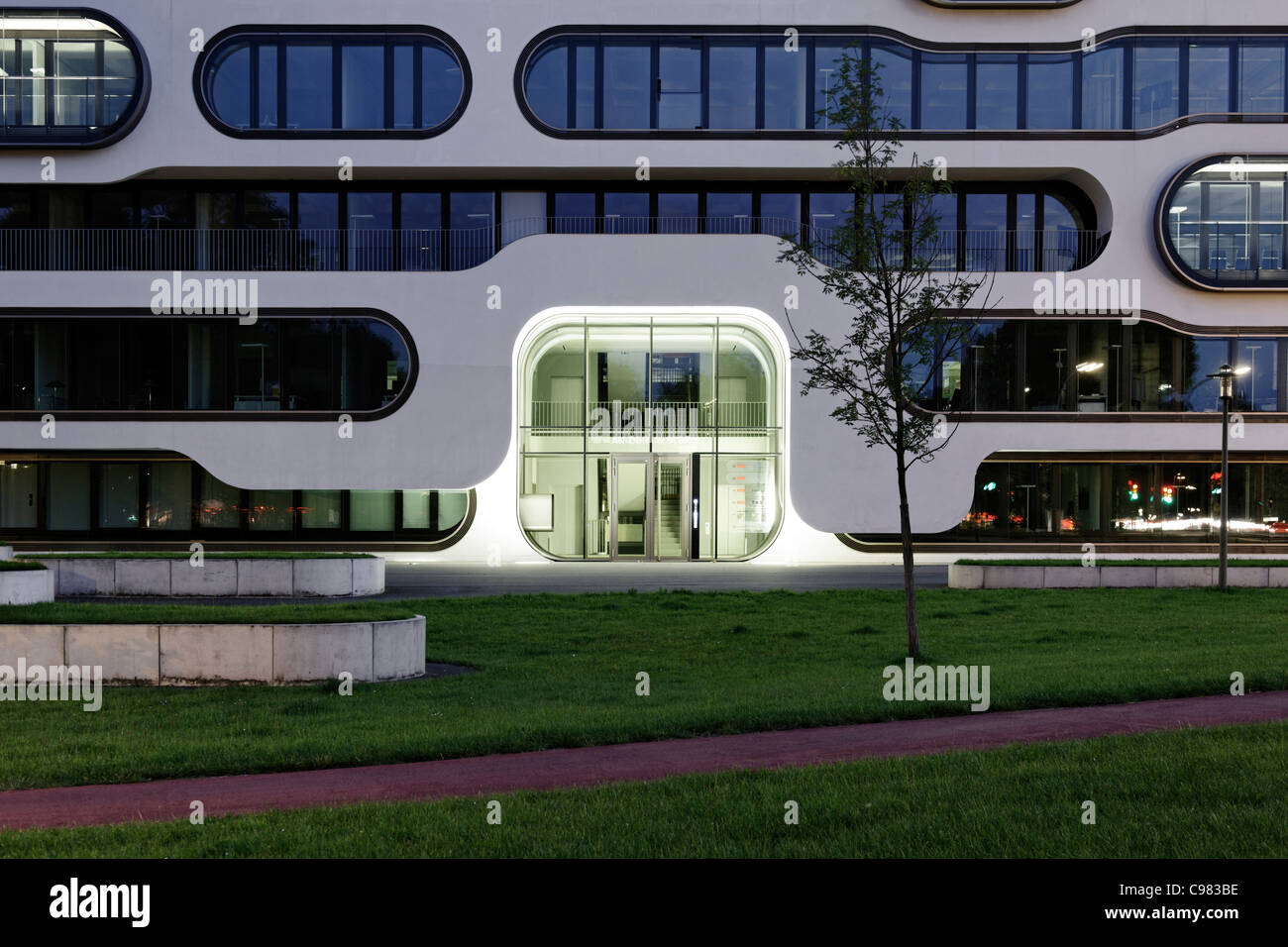 Front, facade, office building, modern architecture, creative, design, at night, An der Alster 1, Hamburg, Germany Stock Photo