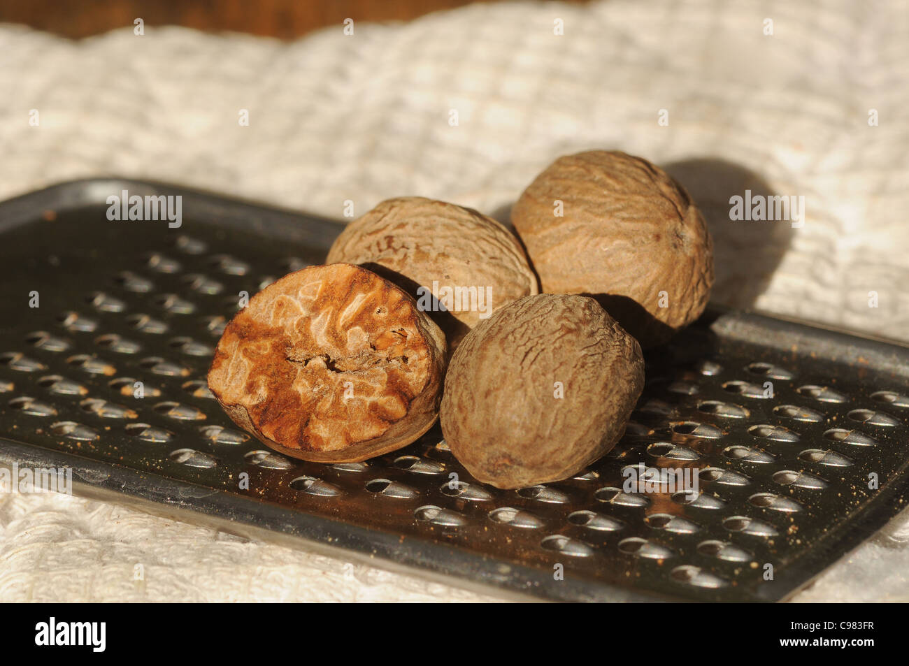 nutmeg and grater Stock Photo Alamy
