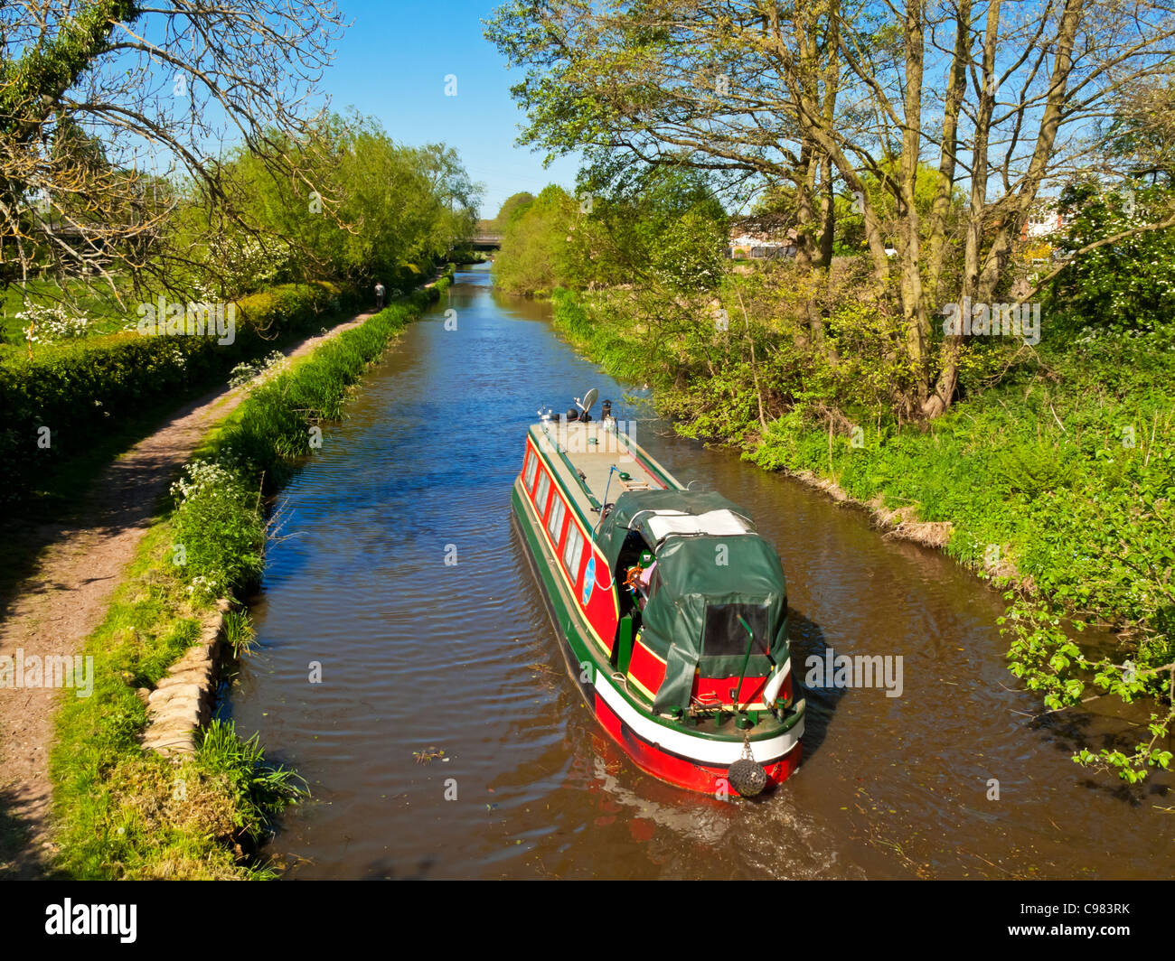 Narrowboat cruising on Staffordshire and Worcestershire Canal in Stafford West Midlands England UK built 1771 by James Brindley Stock Photo